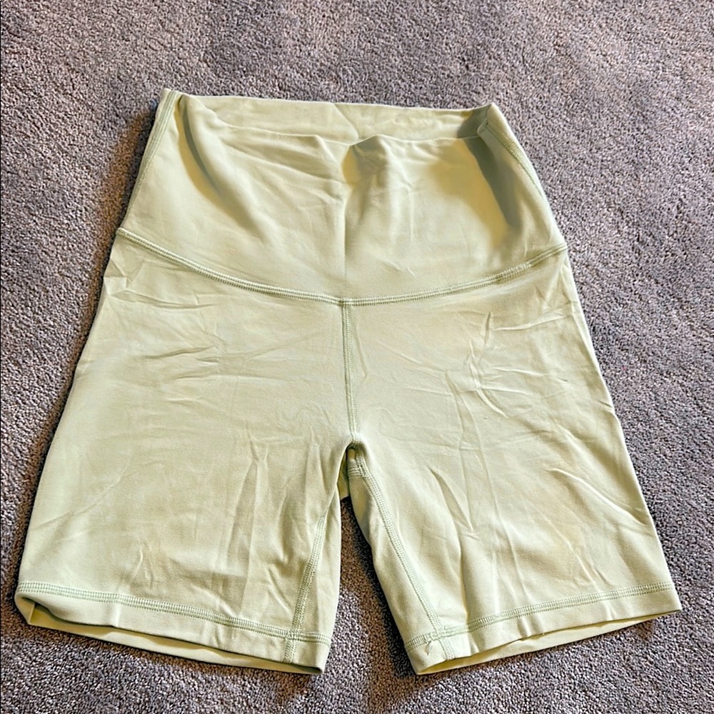 TNA light green bike short 6”
